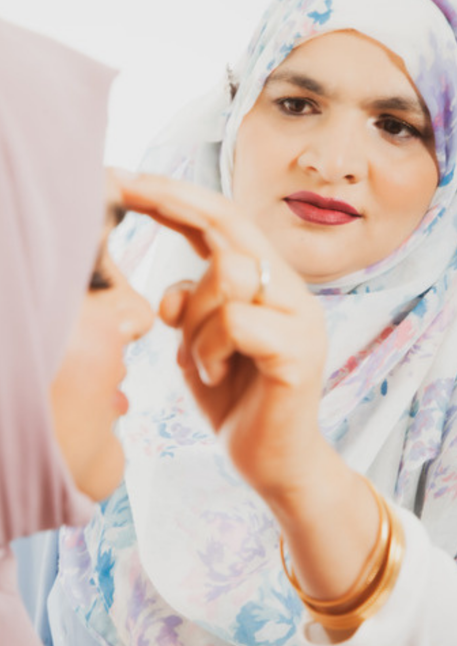 Abida Bano demonstrating EFT tapping